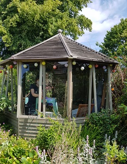 The Milca Garden Bell installation of a Maypole Bells home dumbbell