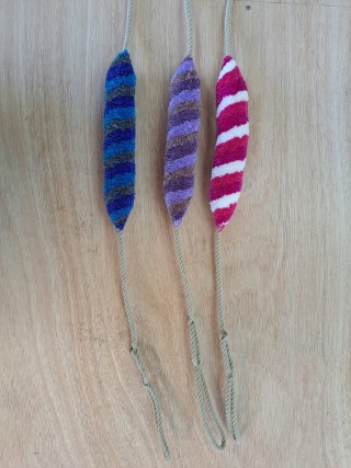 Three examples of six inch light pull with knot and tassel tail.